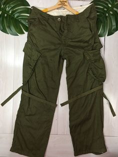 THANK VERY MUCH FOR VISIT OUR PAGE.PLEASE READ CAREFULLY OUR DESCRIPTION AND SATISFIED FIRST Japanese Multipocket Green Army Pants Size : Medium  Condition 9/10  Actual Measurement :  Waist: 34 inches Total Length: 38 Inches Leg size: 9.5 Inches Knee size : 10.5 Inches Inseam: 28 inches Please look detail at the photo for confirmation. If any question please ask to me. **Please dont expect the pieces in mint condition unless state.Its because vintage or used item may have sign of wear.T Importan Military Olive Cargo Pants With Side Pockets, Olive Military Cargo Pants With Side Pockets, Olive Military Cargo Pants With Multiple Pockets, Utility Olive Parachute Pants With Pockets, Utility Olive Cargo Pants With Side Pockets, Olive Utility Cargo Pants With Side Pockets, Khaki Combat Bottoms With Multiple Pockets, Olive Cargo Trousers With Pockets, Military Style High Waist Parachute Pants In Khaki