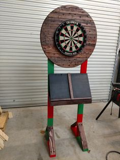 a dart board on top of a wooden stand