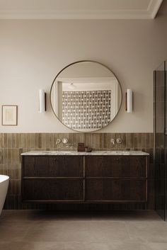 a bathroom with a sink, mirror and bathtub