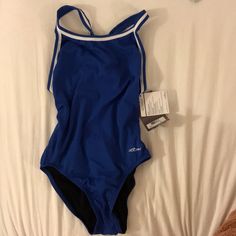 Nwt Dolfin Swimwear Royal Blue Swimsuit Blue Lined One-piece For Swimming, Blue Lined One-piece Swimsuit, Blue Lined Sports Bodysuit, Blue Sleeveless Sports Swimwear, Sleeveless Blue Sports Swimwear, Blue Sleeveless One-piece Swimsuit, Blue One-piece Swimwear For Water Sports, Sports Blue One-piece Swimwear, Blue One-piece Swimwear For Sports