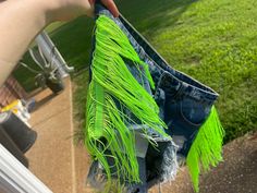 Neon green fringe shorts Can make any color, design, or size. Message me for your custom pair of shorts today! Green Shorts With Frayed Hem, Trendy Green Cutoff Jean Shorts, Trendy Green Cutoff Shorts, Green Summer Bottoms With Frayed Hem, Summer Green Bottoms With Frayed Hem, Green Festival Bottoms With Built-in Shorts, Festival Green Bottoms With Built-in Shorts, Green High-waisted Jean Shorts For Summer, Green Summer Jean Shorts