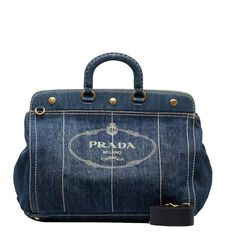 Prada Logo Stitch Denim Handbag Shoulder Bag 2way Indigo Blue Canvas Size:W Approx. 40cm X H Approx. 30.5cm X D Approx. 21.5cm Handle Height: Approx. 7cm Shoulder Height: Approx. ~49cm Color: Indigo Blue Prada Denim, Tas Denim, Denim Handbag, Prada Tote Bag, Sac Diy, Denim Handbags, Sac Lunch, Unique Purses, Denim Tote