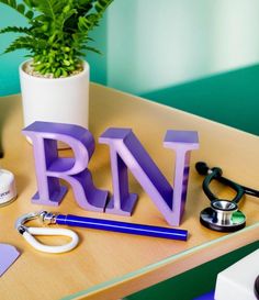 Add a touch of pride and personality to your workspace with this beautifully 3D-printed "RN" desk decor! Standing at approximately 4.5 inches tall and 8.25 inches wide, this sleek and modern design is perfect for any nurse's desk, shelf, or office. Whether you're treating yourself or looking for a thoughtful gift for the nurse in your life, this minimalist yet bold decoration serves as a constant reminder of the dedication and hard work nurses put in every day. Durable and lightweight, the "RN" letters are carefully crafted from high-quality plastic, making them a great addition to any nursing workspace. Whether at home, in the office, or in the breakroom, this piece adds a professional yet personal touch. Nurse Desk, Desk Shelf, The Nurse, Break Room, Office Decoration, Holiday Deals, Nurse Gifts, Desk Decor, Gift Registry