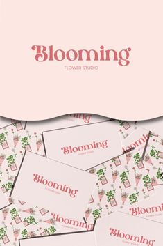 the blooming flower studio logo is shown on top of several cards with pink flowers