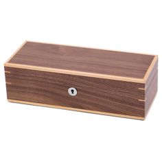 Smooth walnut veneer, solid silver-toned hardware, and a plush velvet interior make this watch box a keepsake. The medium-density fiberboard and the light wooden detailing on the exterior add durability and an attractive decorative look. The interior is velvet lined and cushioned. It contains 5 slots and a pocket inside the lid for additional storage. A metal lock and key are intended for your peace of mind. Keep your watches safe and add a little glamour to your wardrobe with this delightful bo Luxury Watch Box, Rolex Watch Box, Wooden Box Designs, Wood Watch Box, Wooden Watch Box, Engraved Watch, Watch Safes, Mens Watch Box, Firewood Storage