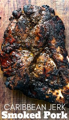 grilled pork chops on a cutting board with the words caribean jerk smoked pork