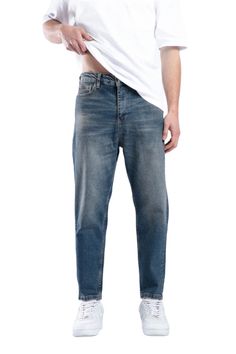 Tapered Jeans, available in a range of colors to suit your style. With an ankle-sized cut, these jeans strike the perfect balance between loose and fitted. The Tapered Fit offers a medium rise, providing ample room in the seat and thigh, while gradually tapering from knee to hem. Crafted from high-quality denim, these jeans are both stylish and cool. Elevate your wardrobe with this fashionable piece that combines comfort and trendiness effortlessly.  Machine wash max. 30ºC/86ºF /Medium Spin/ Do not use bleach/ Iron low tempature/ Do not tumble dry Fabric: Denim  Fit: Loose fit for maximum comfort Care Instructions: Machine wash at a maximum of 30°C (86°F) on a medium spin. Do not bleach. Iron at a low temperature. Do not tumble dry. Stocking Fillers For Him, Stocking Fillers For Her, Tapered Jeans, Men's Beauty, Tie Shoes, Beauty Bag, Square Scarf, Suits You, Independent Designers Fashion