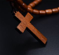 ♥ SOLID WOOD ROSARY - Solid, genuine brown jatoba wood rosary necklace with cross crucifix ♥ BEADED - 9 x 8 Solid Brown Jatoba Oval Shape Beads. ♥ NECKLACE FOR MEN - Can be used around neck or for praying. ♥ LENGHT - 19.5 inches. ♥ HANDCRAFTED - Made in Brazil by artisans with love and devotion. WARNING: CHOKING HAZARD -- Small parts. Not for children under 3 yrs. Brown Cross Rosary In Spiritual Style, Beads Necklace For Men, Adjustable Cross Necklace With Wooden Beads, Spiritual Brown Cross Necklace, Brown Crucifix Necklace In Spiritual Style, Brown Cross Necklace With Wooden Beads, Brown Wooden Beads Cross Necklace, Brown Spiritual Rosary With Cross, Brown Cross Shaped Spiritual Rosary