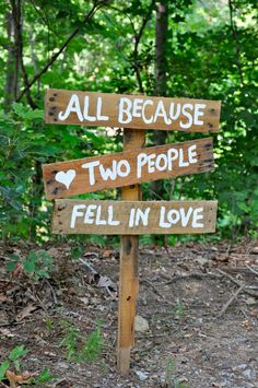 a wooden sign that says all because two people fell in love