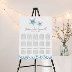 a wedding seating chart with starfish on it