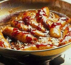 some food is cooking in a pan on the stove