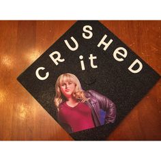 a black graduation cap with the words crushed and a picture of a blonde woman on it