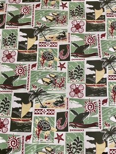 a green and red fabric with birds on it