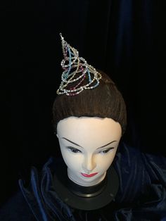 This wonderfully hat ballet headpiece is create with Silver,white pearls,crystal, yellow,light blue and fuchsia Swarovski pearls and bicone .And also rocailles Miyuki beads. Unique pieces hand made with high quality materials, which last in the years. To each single piece is applied a double work, made with a metallic wire and then for safety with a nylon thread that gives resistance. It can be used for Arlequinade ballet variations. It can be personalised in any colour you want. High 9cm Diamet Adjustable Teardrop Crown Headpiece For Party, Adjustable Teardrop Crown Costume Hat For Parties, Whimsical Tall Crown For Parties, Party Crown Headpiece With Beads, Teardrop Crown Headpiece With Rhinestones For Parties, Party Headpiece With Rhinestones And Structured Crown, Party Headpieces With Rhinestones And Structured Crown, Carnival Round Crown Headpiece, Whimsical Crown Headpiece For Party