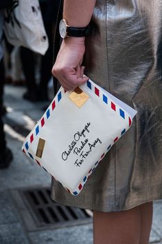 Details in street style. Charlotte Olympia clutch at Paris Fashion Week Spring 2015. #pfw #charlotteolympia Laperm, Sac Diy, Embellished Clutch, 카드 디자인, Paris Mode, Popsugar Fashion, Charlotte Olympia, Cool Street Fashion