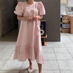 Brand Name: RUGODDecoration: Cascading RuffleStyle: Office LadyMaterial: CottonMaterial: PolyesterOrigin: CN(Origin)Model Number: dy0001Gender: WOMENWaistline: Natural FactorsPattern Type: SolidDresses Length: Ankle-LengthSilhouette: LOOSEAge: Ages 18-35 Years OldNeckline: O-NeckSleeve Style: RegularSleeve Length(cm): ShortSeason: Spring/Autumn Spring Mid-length Dress With Pleated Hem, Pink Midi-length Pleated Dress, Summer Feminine Pleated Dress, Feminine Pleated Skirt Dress For Spring, Feminine Knee-length Pleated Summer Dress, Feminine Summer Knee-length Pleated Dress, Summer Midi-length Dress With Pleated Skirt, Summer Pleated Midi Dress With Ruffles, Summer Midi-length Pleated Dress With Ruffles