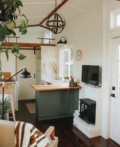 the kitchen is clean and ready to be used as a living room or dining area