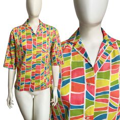 "Vintage 1960s abstract mod tile print poly rayon blend blouse popping with super bright colors. Pearlized button front, a notched collar, side slits and sleeves that can be cuffed. By Lady Manhattan. SIZE: S/M Bust: 37\" Waist: 34\" Hips: 36\" Shoulder seam to shoulder seam: 14\" Length: 24.5\" CONDITION: Excellent vintage condition. Ready to wear. SHOP POLICIES Please carefully read the measurements and look closely at the pictures before making a decision. We are precise with our measurements Retro Multicolor Shirt With Abstract Print, Retro Shirt With Vibrant Multicolor Print, Vintage Multicolor Blouse With Vibrant Print, Retro Multicolor Top With Geometric Pattern, Retro Multicolor Blouse With Colorful Pattern, Retro Multicolor Patterned Blouse, Multicolor Short Sleeve Blouse With Geometric Pattern, Multicolor Retro Blouse With Retro Print, Retro Abstract Print Patterned Blouse