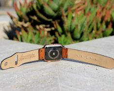 Make your watch stand out with this western leather apple watch band. 30 days returns, free shipping, 1-year warranty. Navajo and Aztec inspired design. Very comfortable to wear daily. Perfect for casual or dressy attire. Unique handmade product requiring 11 hours of artisanal labor. Made by artisan women in Brazil. Use full grain leather (highest leather grade). Un-dyed flexible leather treated with organic beeswax for water resistance. Long lasting and durable leather. For men and women. SizeF Red Dog Collar, Dressy Attire, Beaded Dog Collar, Leather Apple Watch Band, Gold Apple Watch, Watch Stand, Leather Workshop, Apple Watch Bands Leather, Apple Watch Models