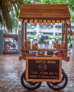 the food cart has many items on it