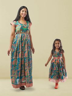 Blue Kalankari Print Mom and Daughter Matching Dresses | Muvvas Boutique | Mother Daughter Dress Matching Blue Bollywood Style Kurta With Floral Print, Festive Sleeveless Blue Kurta, Blue Sleeveless Kurta For Festive Occasions, Festive Blue Sleeveless Kurta, Blue Sleeveless Anarkali Set, Festive Multicolor Ikat Print Dress, Blue Bollywood Sets With Floral Print, Blue Anarkali Kurta With Floral Print, Anarkali Blue Kurta With Floral Print