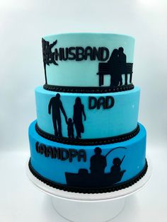 three tiered cake decorated with silhouettes of people and the words husband, dad, grandpa