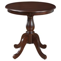 a small wooden table with an oval top