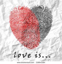 two fingerprints in the shape of a heart on crumpled paper with words love is