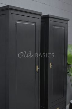 two black cupboards sitting next to each other