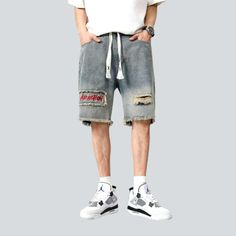 Take your city trend to a whole new level with our 2023 Summer Collection Contrast Overlapped Ripped Denim Shorts. Showcasing a mid-rise fit. zipper & button closure. and slouchy silhouette. these shorts bring together vintage allure and couture fashion. making them perfect for any occasion. Key Features: Retro & Contemporary: The perfect blend of vintage allure and today's spirited vogue pulse. Mid-Waist Fit: Showcase sun-kissed skin and radiant confidence with a flattering mid-waistline shape. Distressed Jean Shorts For Summer Streetwear, Ripped Denim Shorts For Streetwear, Casual Distressed Shorts For Streetwear, Ripped Relaxed Fit Casual Shorts, Casual Distressed Jean Shorts For Streetwear, Casual Jean Shorts With Frayed Hem For Streetwear, Ripped Bottoms For Streetwear In Summer, Casual Ripped Medium Wash Shorts, Casual Ripped Jean Shorts With Relaxed Fit