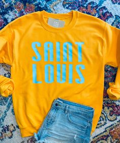 This item is made with heat transfer vinyl which has a secure hold for durability and long-lasting wear. This high-quality heat transfer will make it seems as thought the design is simply part of the clothing. * Use code STLPICKUP at checkout to pick up item in Creve Coeur, St. Louis, MO * Blue Graphic Print Sweatshirt For Team Spirit, Blue Pre-shrunk School Spirit Sweatshirt, Relaxed Fit Blue Pre-shrunk Sweatshirt, Blue Relaxed Fit Pre-shrunk Sweatshirt, Blue Fan Apparel Sweatshirt With Graphic Print, Blue Graphic Print Fan Apparel Sweatshirt, Yellow Sporty Sweatshirt With Graphic Print, Sporty Yellow Sweatshirt With Graphic Print, Team Spirit Sweatshirt With Screen Print