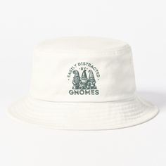 Stay stylish and protected in the garden with this adorable bucket hat featuring a vintage-inspired design of three gnomes and the funny quote, "Easily Distracted by Gnomes." Perfect for garden lovers, plant ladies, and anyone who adores gnome-themed decor, this hat combines function and charm. Ideal for sunny gardening days, outdoor adventures, or adding a playful touch to any casual outfit. A thoughtful gift for gnome enthusiasts, funny gardening fans, and nature lovers. Perfect for gardeners, plant parents, and those who love whimsical outdoor fashion.