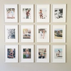 a bunch of pictures are hanging on the wall with white frames around them, all displaying different family photos