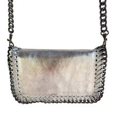 Nwot Borse In Pelle Genuine Leather Silver Clutch Crossbody Chain Made In Italy Made In Italy Goes Anywhere, All Occasions, Perfect Travel Bag. * Convertible 2 In 1 Bag - Crossbody Or Clutch * Silver Leather * Detachable Chain Strap * Whipstitching Around The Bag * Chain Detail Around The Bag * Silver-Tone Hardware * Magnetic Closure Flap * Zipper Closure Under Flap Size Approx. 8.5"W X 5.5"H X 1.5" D New Without Tags Convertible Bag, Clutch, Crossbody, Silver, Glam, Casual, Music Festival, Gues Glam Casual, Rose Tote Bag, Vera Bradley Tote Bags, Perfect Travel Bag, Soft Leather Tote, Victoria Secret Tote Bags, Neverfull Mm Monogram, Coach Tote Bags, Silver Clutch