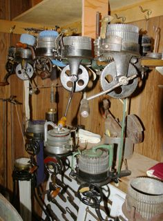 many different types of machinery are on display in a room with wood paneled walls