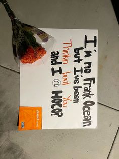 there is a sign that has been placed on the ground for someone to put flowers in it