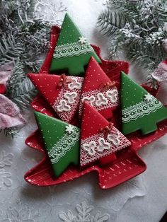 small christmas trees are sitting on a plate