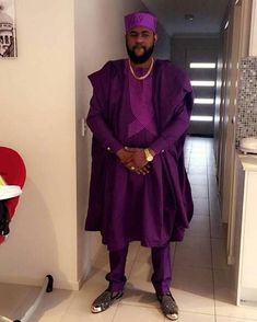 This purple Agbada for men is a must have for any african man who wants to impress. With its history deeply rooted in the cultures of the indigenous Yoruba people of Nigeria, this formal outfit has always been worn with prestige and perceived affluence. The set includes a kaftan and trouser with the agbada itself. Order yours now. What you see is what you get. Please note: these measurements are general. If you have the choice to measure yourself with a measuring tape, please opt to send us thos African Men Clothing, Matching Pants Set, African Suit, African Attire For Men, Afrikaanse Mode, African Dashiki, African Clothing For Men, Mens Attire, African Men Fashion