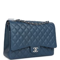 This Maxi Classic Double Flap bag is in dark blue caviar leather with silver hardware and features a front flap with signature CC turnlock closure, half moon back pocket, and adjustable interwoven silver tone chain link and dark blue leather shoulder strap.The interior is lined in dark blue leather with a "love letter" zipper compartment under the first flap, an "outer" slit pocket under the second flap, and an interior compartment with two open pockets separated by a "lipstick" compartment.Collection: 15C (2014)Origin: FranceCondition: Never wornAccompanied by: Chanel box, Chanel dustbag, COA card, carebook, retail UPC, feltMeasurements: 13" width x 8.5" height x 4" depth; 19" strap drop (10.5" doubled) Chanel Maxi, Chanel Box, Hermes Birkin 25, Bag Dark, A Love Letter, Birkin 25, Love Letter, Hermes Birkin, Flap Bag