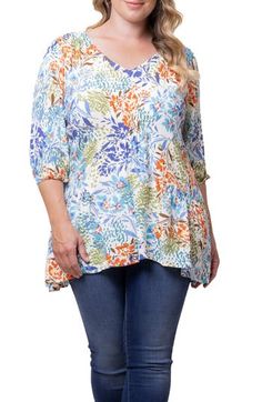 Gathers at the shoulders and waist softly shape this vibrant tunic that adds a punch of lively color to your day. 30 1/2" length (size 1X) V-neck Elbow-length sleeves 100% rayon Hand wash, line dry Made in the USA of imported fabric Casual Rayon Tunic For Spring, Casual Flowy Tunic With Floral Print, Multicolor Relaxed Fit Rayon Tops, Casual V-neck Tunic For Brunch, Relaxed Fit Multicolor Rayon Tops, Casual Flowy Floral Print Tunic, Rayon Tunic For Spring, Casual Multicolor Tunic For Fall, Flowy Multicolor Tunic For Spring