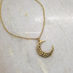 18K Gold Calligraphic Written on Moon Islamic Necklace, Engraving Moon Necklace, Arabic Necklace, Moon Necklace Gold, Minimal Moon Jewelry Details:- Length: 17 inches + Extender  Material: 18k gold plated, Brass Care:- When not wearing, please keep in a sealed plastic bag Packaging: All our pieces comes in a gift box bag so your item is ready to be gifted If you have any question feel free to contact us via Etsy message Happy Shopping Gold Moon-shaped Engraved Necklace, Engraved Moon-shaped Brass Necklace, Engraved Moon Shaped Brass Necklace, Engraved Brass Moon Necklace, Gold Engraved Moon Necklace, Moon Shaped Necklace With Moon Print For Gift, Half Moon Jewelry With Moon Print For Gift, Moon Print Necklace Perfect For Gifts, Moon Print Moon Shaped Necklace For Gift