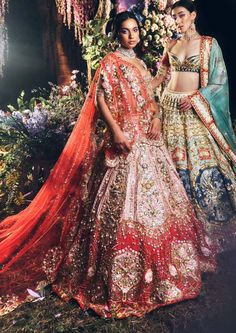 Editor's Note Featuring a 3 piece bridal lehenga set in pink & red raw silk embroidered with gold metal embellishments, pearls, glass cut beads, and precious stones. It is paired with a... Traditional Dresses Indian, Lilac Lehenga, Scalloped Dupatta, Indian Fits, Pink Bridal Lehenga, Papa Don't Preach, Lehenga Red, Metal Embellishments, Designer Bridal Lehenga