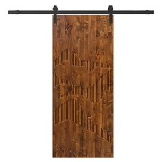 a wooden door with an intricate design on the front and side panel, hanging from a black metal bar