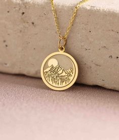 Gold Mountain moon Pendant - Mountain moon Gold Necklace ● Material of pendant: Solid Gold 14k ( REAL GOLD ) ● Metal Stamp: 14k ( REAL GOLD ) ● The pendant is available in 5 sizes: - 12,7 mm / 0.5 inches (Diameter) - 14,0 mm / 0,55 inches ( Diameter ) In the photos - 15,3 mm / 0.6 inches ( Diameter ) - 16,5 mm / 0,65 inches ( Diameter ) - 19,1 mm / 0,75 inches ( Diameter ) ( In the photos the size is 14mm / 0.55 inches Diameter ) ( Jump Ring inner diameter: 4 mm ) ● Material of chain: Solid gold Gold Engraved Moon-shaped Jewelry, Gold Moon-shaped Engraved Jewelry, Gold Moon-shaped Engraved Necklace, Sun And Moon Design Medallion Necklace For Gift, Engraved Moon-shaped Yellow Gold Necklace, Gold Engraved Moon Necklace, Engraved Moon Shaped Yellow Gold Necklace, Gift Necklace With Sun And Moon Round Pendant, Moon Shaped Jewelry With Chain For Gifts