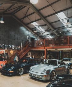 there are many cars parked in the garage