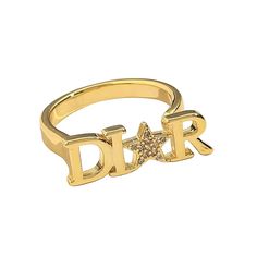 Experience a blend of luxury and nostalgia with the Dior Star Diamond Ring. Available in exquisite gold or stunning silver, this unique piece redefines elegance with a Y2K twist. The iconic "O" in Dior is transformed into a dazzling diamond star, capturing attention and sparking conversation. Perfect for those who appreciate high-end fashion with a touch of retro flair, the Dior Star Diamond Ring is a must-have accessory that elevates any outfit. Luxury Star-shaped Ring With Single Diamond, Luxury Star-shaped Diamond Ring With Accents, Adjustable Gold Star Ring, Elegant Diamond Star-shaped Signet Ring, Luxury Gold Star-shaped Rings, Adjustable Gold Star-shaped Rings, Luxury Gold Star-shaped Signet Ring, Dior Star, Party Rings