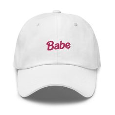 Babe Hat Trendy Cotton Snapback Hat For Beach, Cotton Brimmed Dad Hat For Beach, Summer Cotton Brimmed Trucker Hat, Summer Brimmed Cotton Trucker Hat, Cotton Brimmed Trucker Hat For Summer, Adjustable Curved Brim Fun Dad Hat, Trendy Brimmed Cotton Baseball Cap, Fun White Cotton Sun Hat, Fun Summer Dad Cap