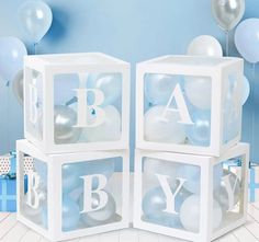 baby blocks with balloons in the background