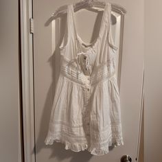 White Button-Down Dress From Urban Outfitters Never Worn Great Condition Casual Urban Outfitters Mini Dress For Day Out, White Buttoned Dress For Daytime, Spring Dresses With Buttons By Urban Outfitters, White Buttoned Mini Dress For Vacation, Summer Mini Dress With Buttons For Daywear, Spring Dresses With Buttons From Urban Outfitters, White Sundress With Buttons, Casual Urban Outfitters Mini Dress For Daywear, White Buttoned Sundress Mini Dress