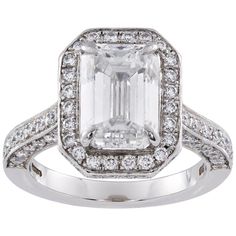 An emerald-cut diamond cluster ring, the central diamond weighing 2.22 carats, accompanied by GIA Report stating to be of D colour Internally Flawless, surrounded by an octagonal-shaped frame set with brilliant-cut diamonds and diamond encrusted gallery and shoulders, hallmarked London, platinum, 2014, made by Boodles, the head measuring approximately 1.3x1cm, finger size G, gross weight 6.5 grams. This ring is in excellent condition. This fabulous diamond ring was made by Boodles and comes from Romantic Rings, Diamond Jewelry Designs, Classic Engagement Rings, Diamond Cluster Ring, Emerald Cut Diamonds, Frame Set, Diamond Cluster, Jewelry Rings Engagement, Cluster Ring